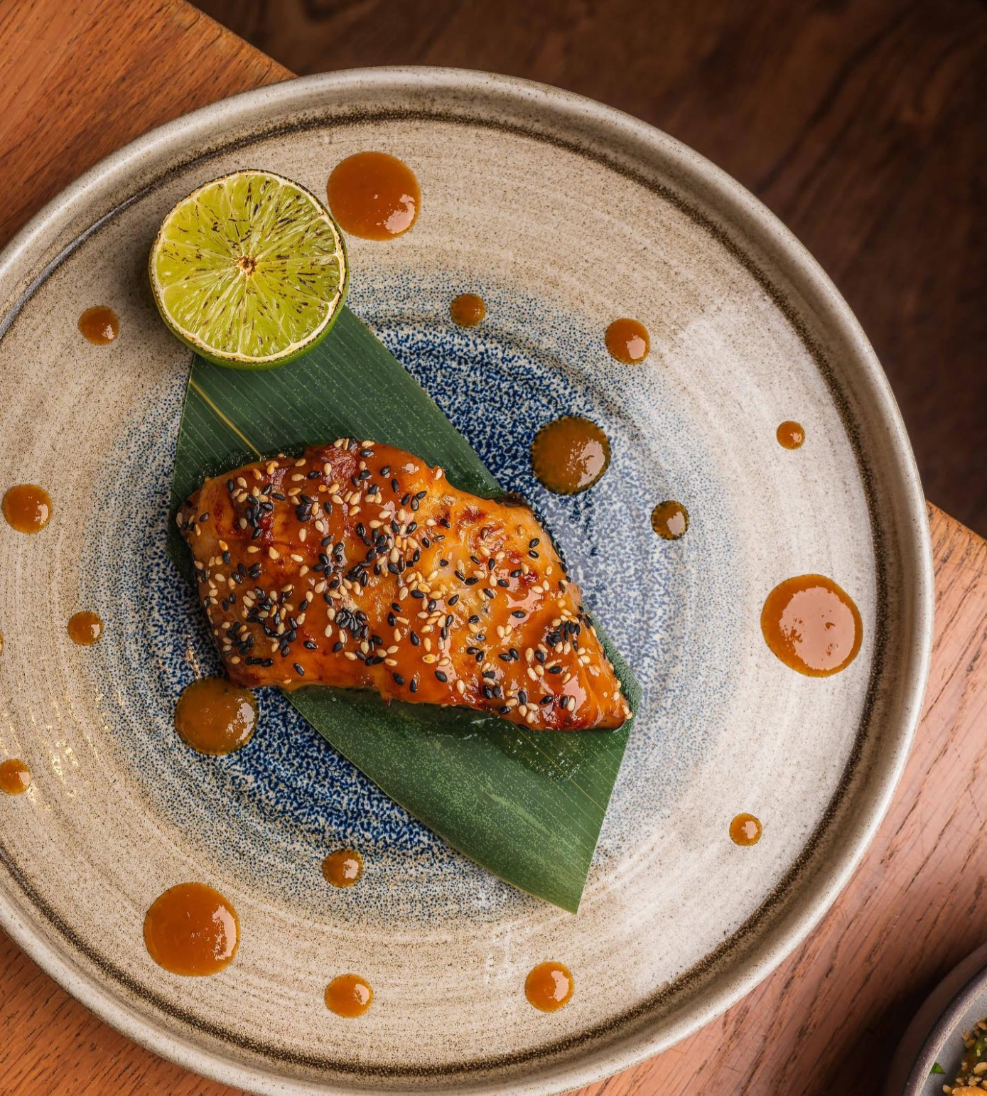 Glazed fish on banana leaf